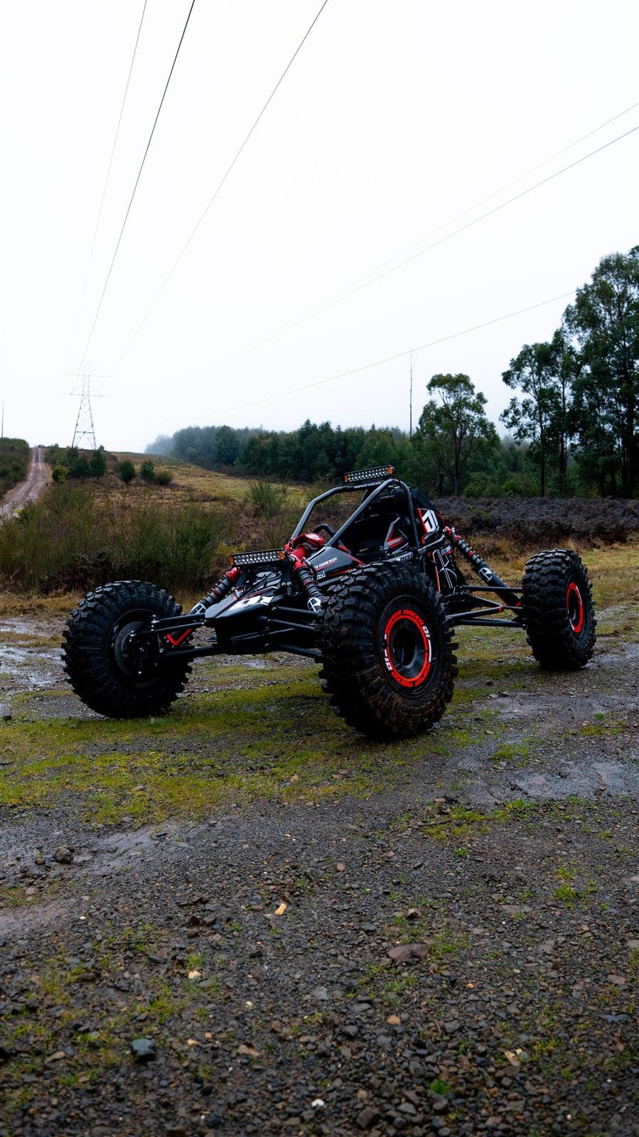 The Hyper Racer D1 on a wet forest trail